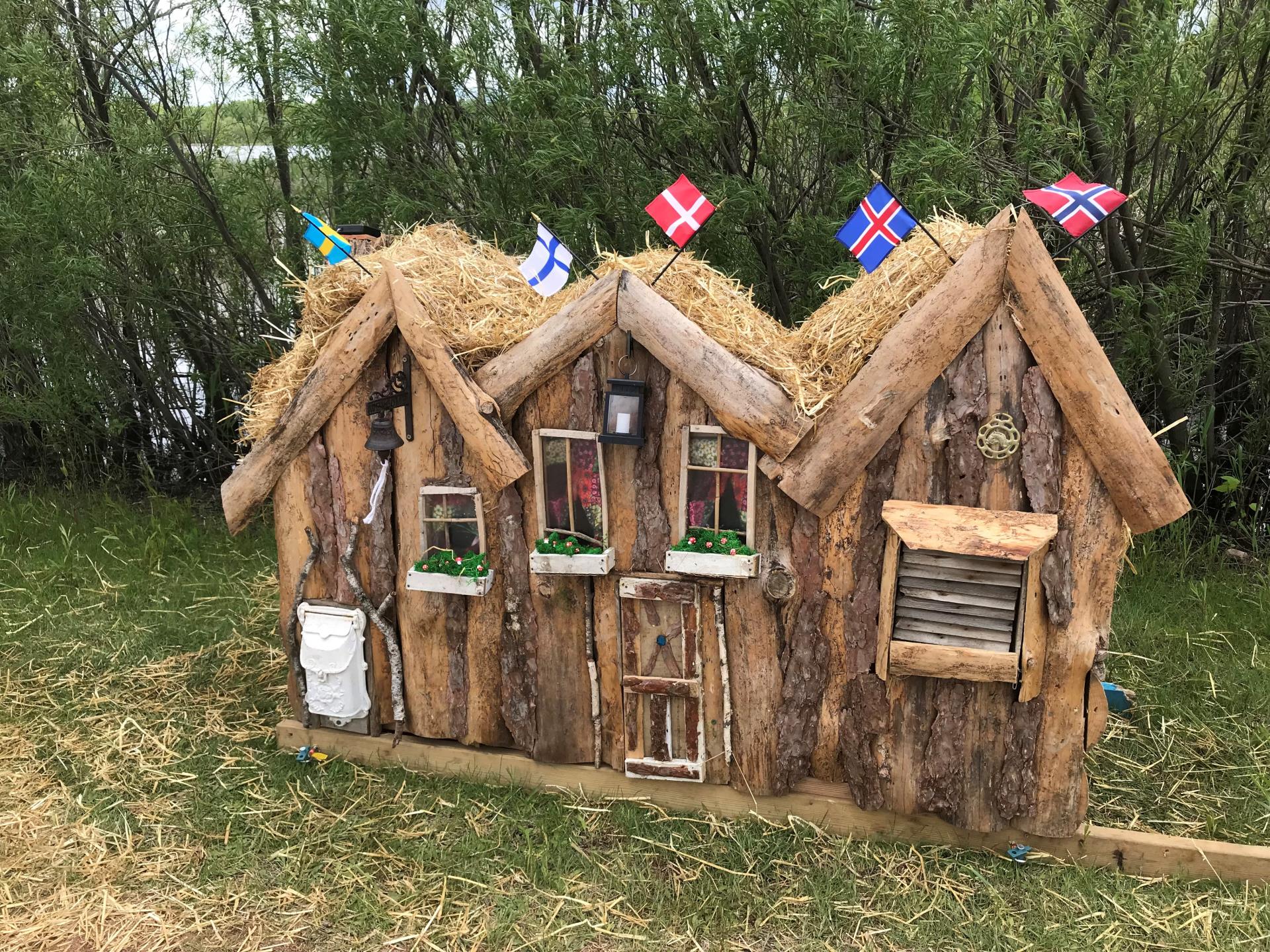 Wooden Elf House rotating art installation