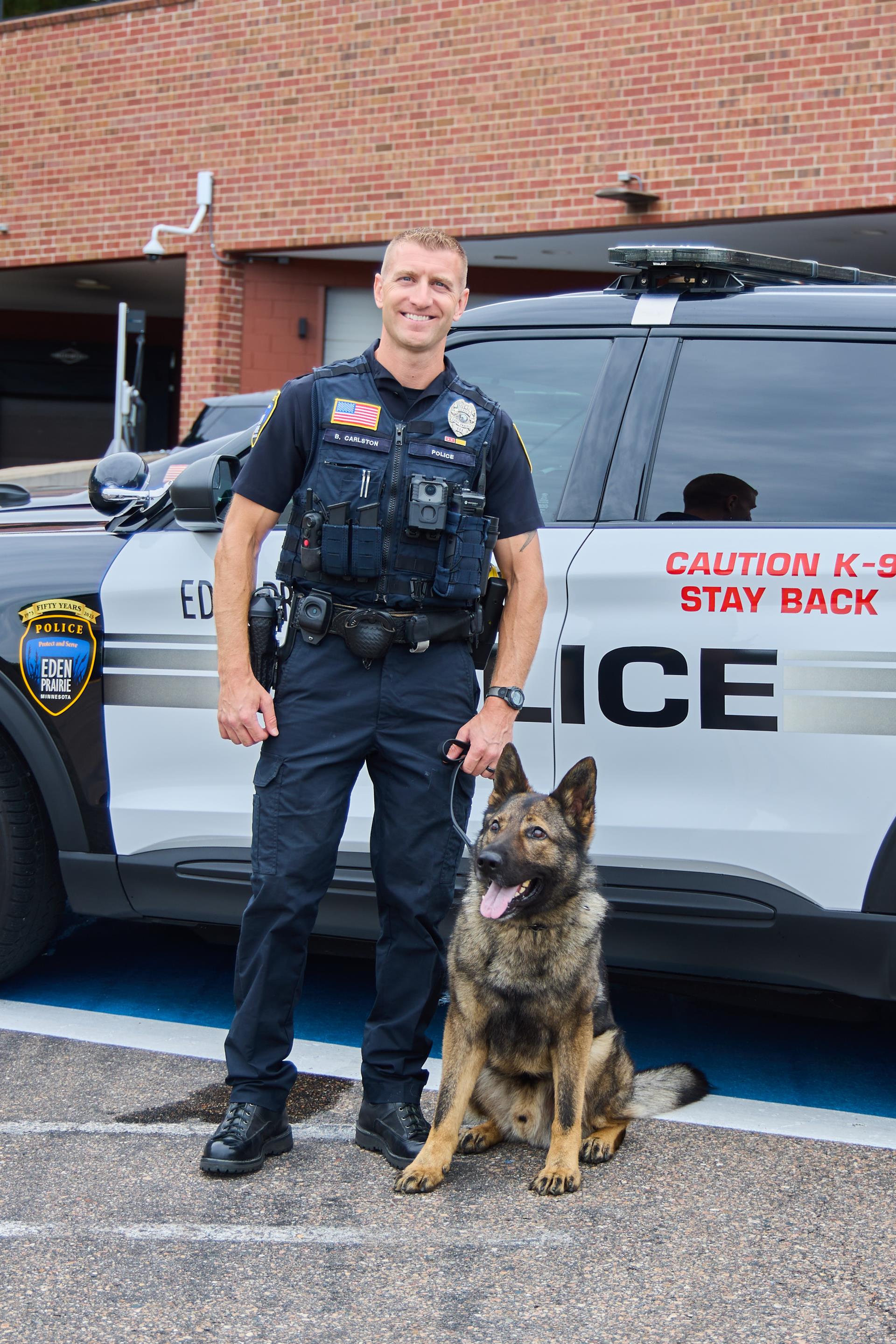 Officer Brandon Carlson and K-9