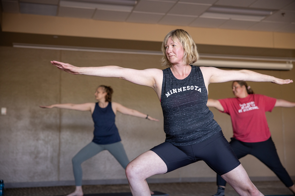 Three women participating in a Body Balance class at the Community Center