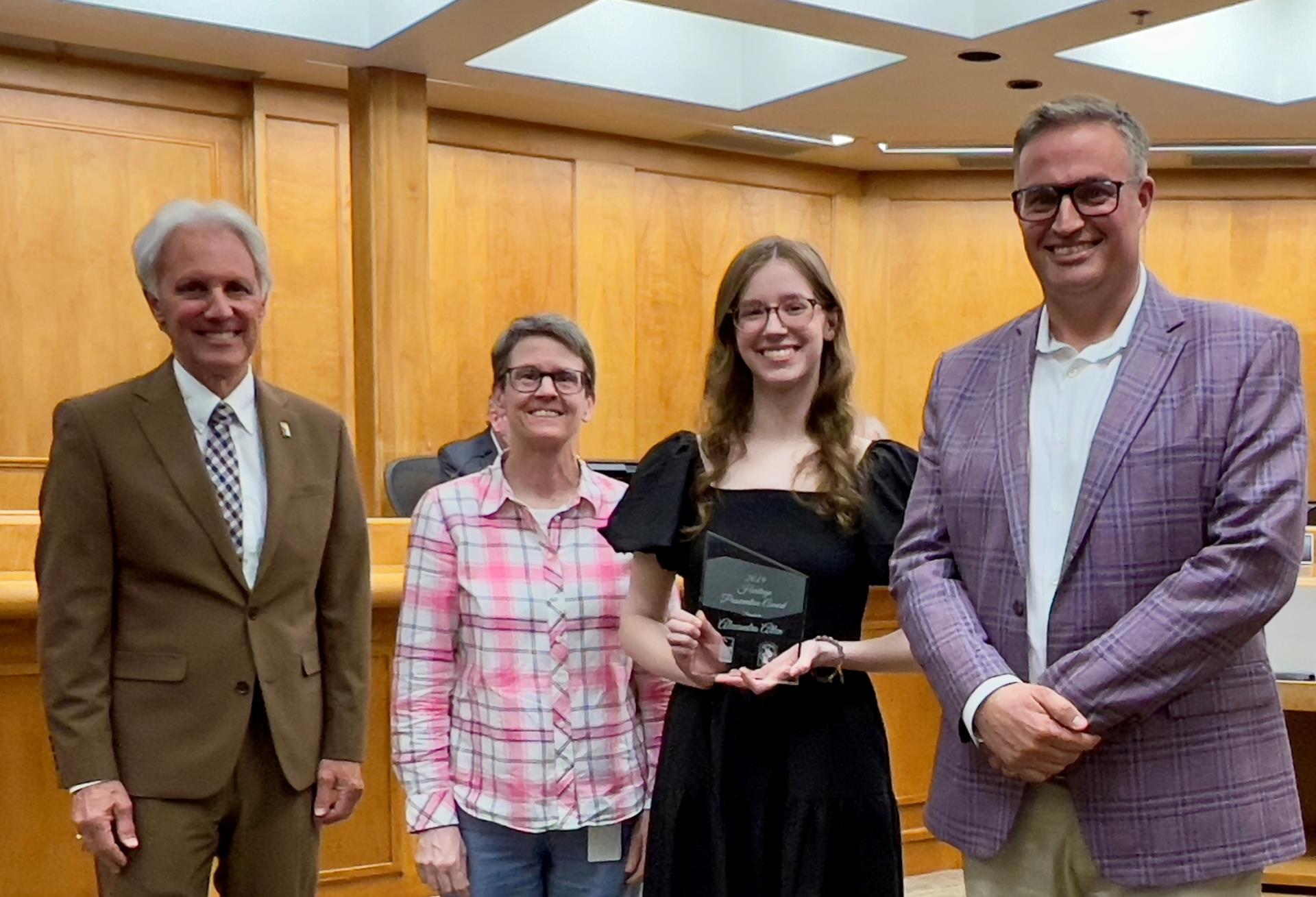 Alexandra (Sasha) Allen holds 2024 Heritage Preservation Award