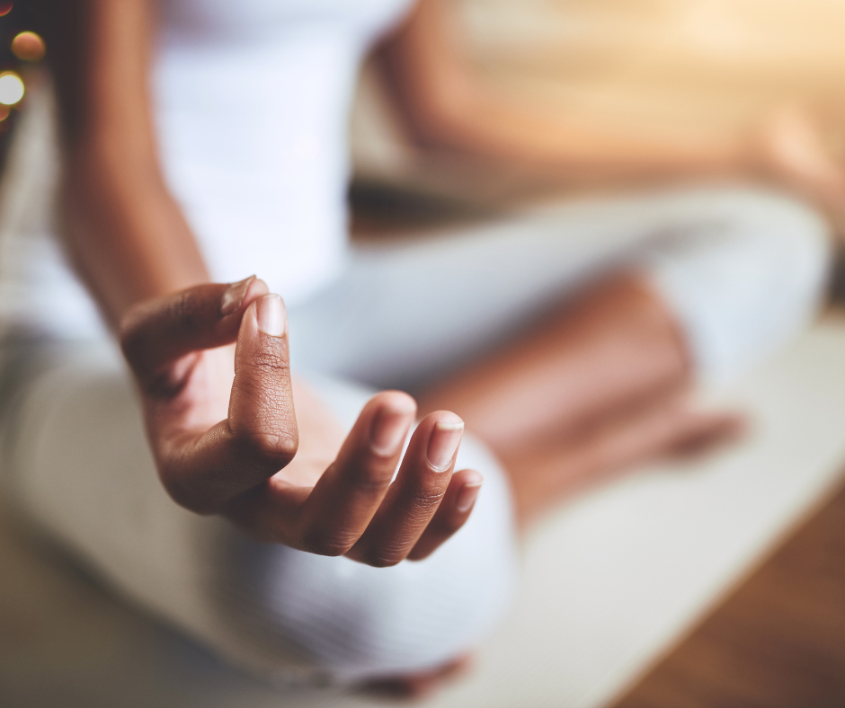 close-up of an individual practicing meditation