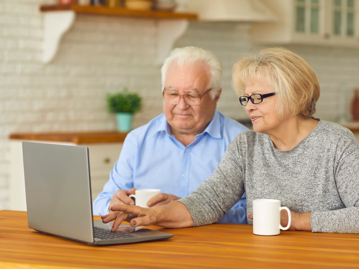 Older couple looking at laptop