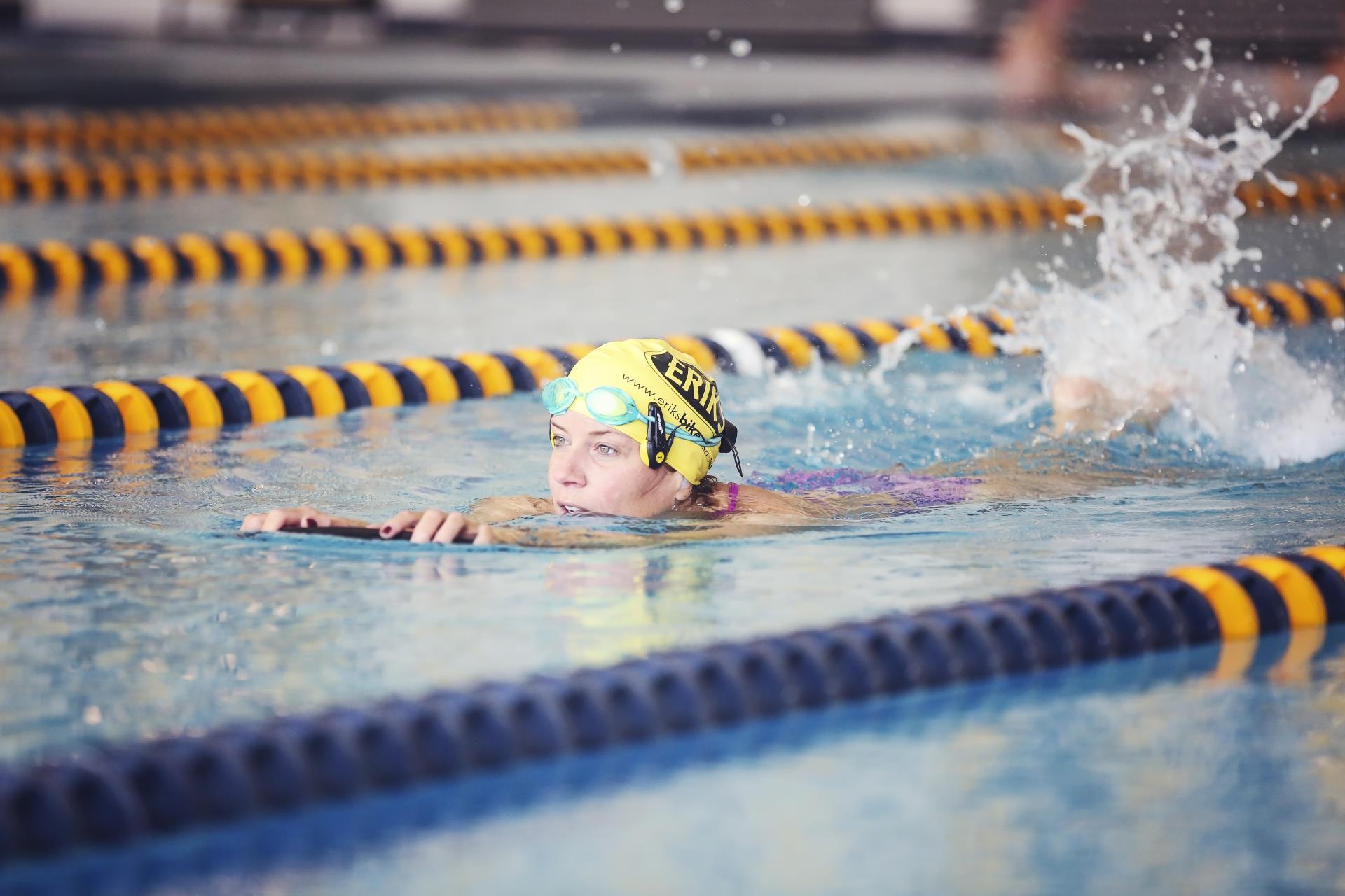 Swimmer in pool lane