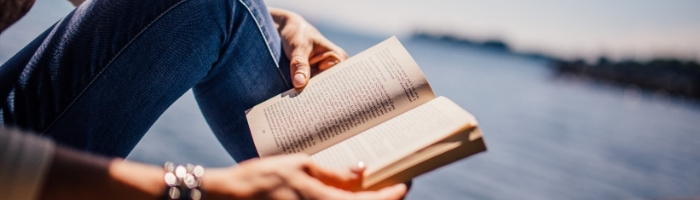 Hands holding a book